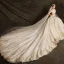 Elegant Champagne Wedding Dresses 2019 Ball Gown Off-The-Shoulder 1/2 Sleeves Backless Appliques Lace Beading Glitter Tulle Cathedral Train Ruffle