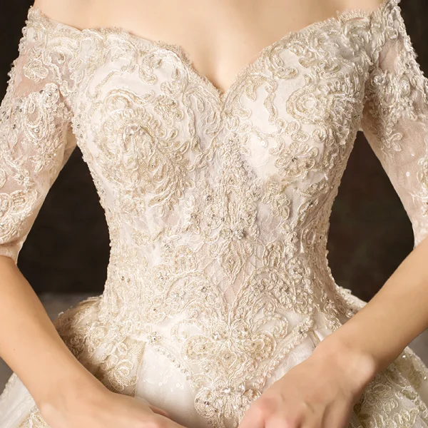 Elegant Champagne Wedding Dresses 2019 Ball Gown Off-The-Shoulder 1/2 Sleeves Backless Appliques Lace Beading Glitter Tulle Cathedral Train Ruffle