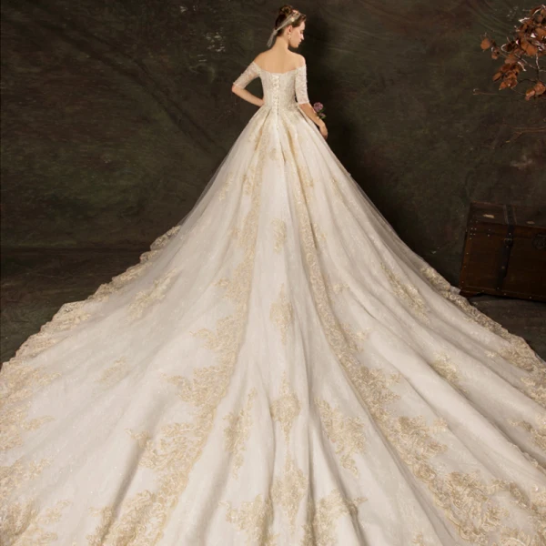 Elegant Champagne Wedding Dresses 2019 Ball Gown Off-The-Shoulder 1/2 Sleeves Backless Appliques Lace Beading Glitter Tulle Cathedral Train Ruffle