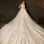 Elegant Champagne Wedding Dresses 2019 Ball Gown Off-The-Shoulder 1/2 Sleeves Backless Appliques Lace Beading Glitter Tulle Cathedral Train Ruffle