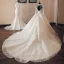 Luxe Vintage / Originale Champagne Transparentes Robe De Mariée 2019 Style Audrey Hepburn Robe Boule Col Haut Manches Longues Dos Nu Appliques En Dentelle Perlage Glitter Tulle Cathedral Train Volants