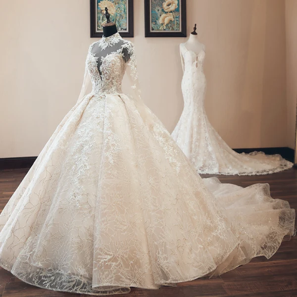 Luxe Vintage / Originale Champagne Transparentes Robe De Mariée 2019 Style Audrey Hepburn Robe Boule Col Haut Manches Longues Dos Nu Appliques En Dentelle Perlage Glitter Tulle Cathedral Train Volants