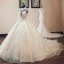 Luxe Vintage / Originale Champagne Transparentes Robe De Mariée 2019 Style Audrey Hepburn Robe Boule Col Haut Manches Longues Dos Nu Appliques En Dentelle Perlage Glitter Tulle Cathedral Train Volants