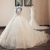 Luxury / Gorgeous Vintage / Retro Champagne See-through Wedding Dresses 2019 Audrey Hepburn Style Ball Gown High Neck Long Sleeve Backless Appliques Lace Beading Glitter Tulle Cathedral Train Ruffle