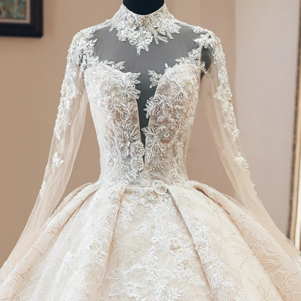 Luxe Vintage / Originale Champagne Transparentes Robe De Mariée 2019 Style Audrey Hepburn Robe Boule Col Haut Manches Longues Dos Nu Appliques En Dentelle Perlage Glitter Tulle Cathedral Train Volants
