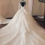 Luxe Vintage / Originale Champagne Transparentes Robe De Mariée 2019 Style Audrey Hepburn Robe Boule Col Haut Manches Longues Dos Nu Appliques En Dentelle Perlage Glitter Tulle Cathedral Train Volants