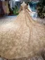 Luxe Doré Robe De Mariée 2019 Robe Boule Glitter Tulle Encolure Dégagée Perlage Cristal Gland En Dentelle Fleur Manches Longues Dos Nu Royal Train