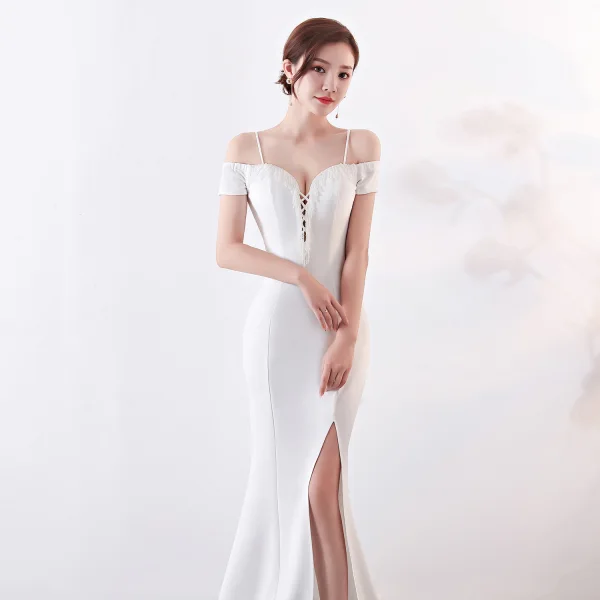 Chic / Belle Couleur Unie Ivoire Robe De Soirée 2019 Trompette / Sirène Bretelles Spaghetti Perlage Gland Sans Manches Dos Nu Fendue devant Longue Robe De Ceremonie