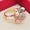 Chic / Beautiful Gold Pearl Rhinestone Lucky Faith Ring Alloy Red Carpet Rings 2019 Accessories