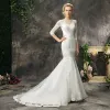 Modest / Simple Church Hall Wedding Dresses 2017 Champagne Trumpet / Mermaid Court Train Scoop Neck 3/4 Sleeve Backless Crossed Straps Lace Appliques