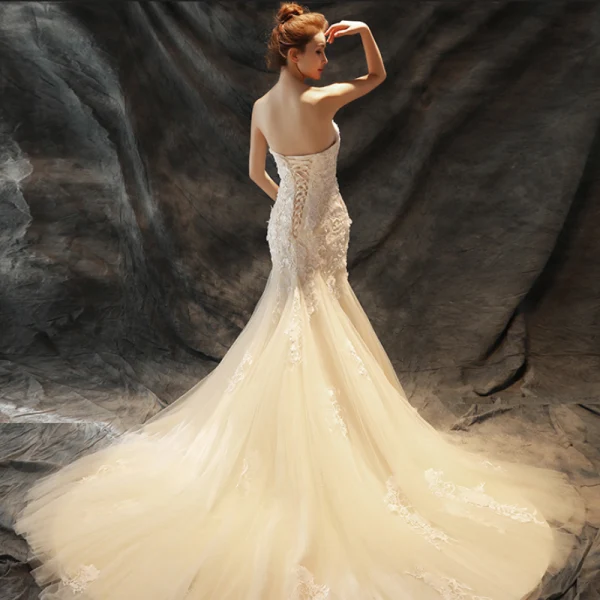 Chic / Beautiful Wedding Dresses 2017 Champagne Trumpet / Mermaid Chapel Train Cascading Ruffles Strapless Sleeveless Backless Lace Appliques Pearl