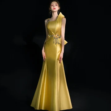 Amazing Unique Gold Evening Dresses 2018 Trumpet Mermaid Appliques Beading Tassel Crystal Rhinestone Scoop Neck Backless Sleeveless Floor Length Long Formal Dresses