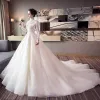 Chic / Beautiful Champagne Wedding Dresses 2018 Ball Gown Lace Appliques High Neck Backless Long Sleeve Cathedral Train Wedding