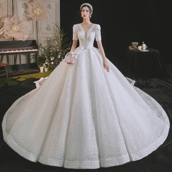 Luxury Gorgeous White Wedding Dresses 2021 Ball Gown Scoop Neck Beading Pearl Rhinestone Bow Short Sleeve Backless Royal Train Wedding