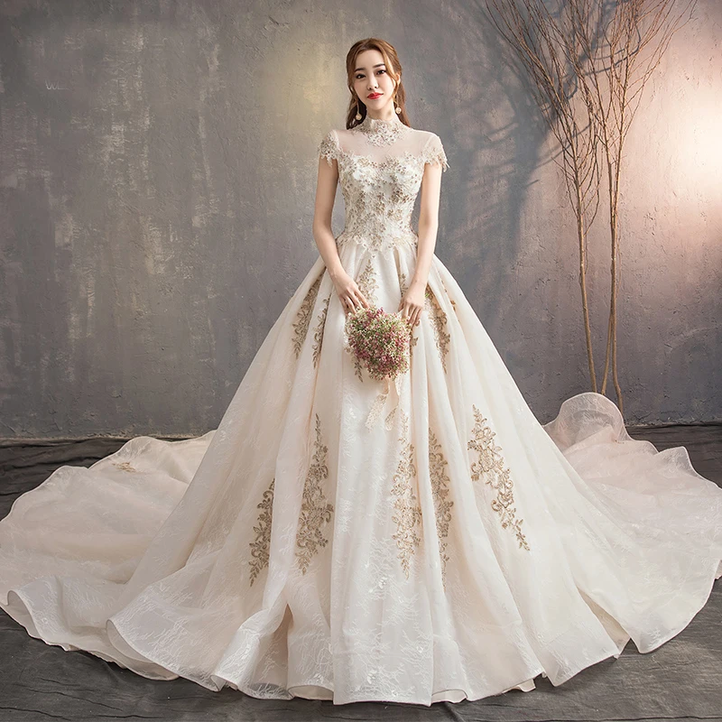 white christmas dresses Vintage Beaded Champagne Wedding Dresses with Long Sleeves VW1571 –  Viniodress main image 0