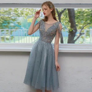 Glittrande Himmelsblå Studentklänningar 2021 Prinsessa Urringning Beading Tassel Paljetter Ärmlös Halterneck Te Längd Afton Formella Klänningar