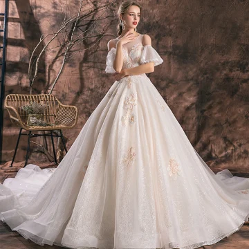 Élégant Champagne Robe De Mariée 2019 Robe Boule Encolure Dégagée En Dentelle Fleur Manches Courtes Dos Nu Royal Train