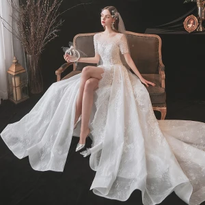 Charming Ivory Split Front Wedding Dresses 2021 A Line Princess Scoop Neck Beading Lace Flower Sash Short Sleeve Backless Wedding Royal Train