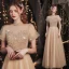 Charmant Doré Étoile Paillettes Robe De Bal 2021 Princesse Col Haut Perlage Manches Courtes Dos Nu Noeud Longue Promo Robe De Ceremonie