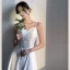 Schlicht Ivory / Creme Spitze Blumen Strand Brautkleider / Hochzeitskleider 2021 A Linie Spaghettiträger Ärmellos Rückenfreies Wadenlang Hochzeit
