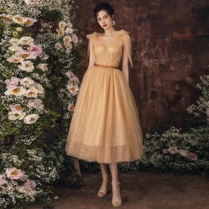Chic Belle Champagne Paillettes De Retour Robe De Graduation 2021 Princesse V Cou Sans Manches Ceinture Thé Longueur Robe De Ceremonie