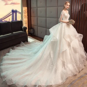 Charming Ivory Wedding Dresses 2019 Ball Gown Scoop Neck Lace Flower Beading Tassel Short Sleeve Backless Cascading Ruffles Cathedral Train Wedding