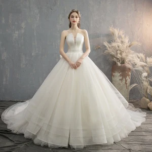 Sjarmerende Champagne Brudekjoler 2019 Prinsesse Strapless Sløyfe Uten Ermer Ryggløse Cathedral Train