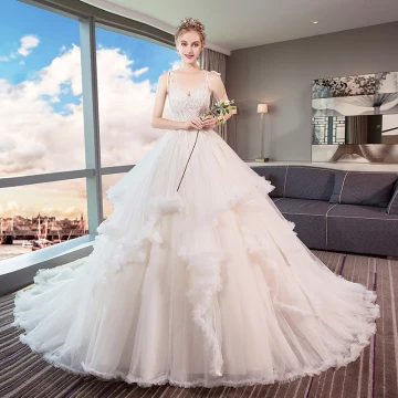 Chic Belle Ivoire Robe De Mariée 2019 Princesse Bretelles Spaghetti Perlage En Dentelle Fleur Sans Manches Dos Nu Volants En Cascade Cathedral Train