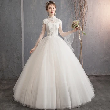 Élégant Champagne Robe De Mariée 2019 Princesse Col Haut Appliques En Dentelle Fleur Perlage Perle Paillettes Manches Longues Dos Nu Longue