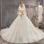 Fabuleux Champagne Robe De Mariée 2019 Princesse Bustier Perlage Paillettes Sans Manches Dos Nu Appliques Noeud Royal Train