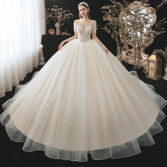 Moderne Mode Champagne Robe De Mariée 2021 Robe Boule Encolure Dégagée Perlage Perle Paillettes Manches Courtes Dos Nu Royal Train Mariage