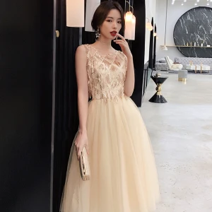 Moderne Mode Champagne Robe De Soirée 2019 Princesse Encolure Dégagée Paillettes Sans Manches Thé Longueur Robe De Ceremonie