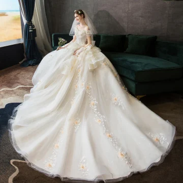 Luxury Gorgeous Champagne Wedding Dresses 2019 Ball Gown Off The Shoulder Beading Pearl Crystal Tassel Lace Flower Short Sleeve Backless Cascading Ruffles Cathedral Train