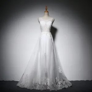 Élégant Blanche Robe De Mariée 2018 Princesse En Dentelle Appliques Transparentes Encolure Dégagée Dos Nu Sans Manches Longue Mariage