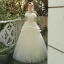 Charmant Ivory / Creme Brautkleider / Hochzeitskleider 2019 A Linie Rüschen Bandeau Applikationen Pailletten Spitze Blumen Ärmellos Rückenfreies Lange