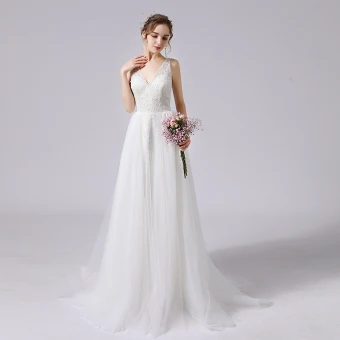 Élégant Ivoire Glitter Robe De Mariée 2021 Princesse Perlage V Cou Sans Manches Dos Nu Train De Balayage Mariage