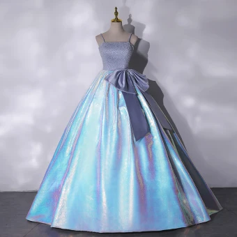 Scintillantes Perlage Paillettes Laser Robe De Bal 2021 Bretelles Spaghetti Sans Manches Noeud Dos Nu Longue Robe De Ceremonie