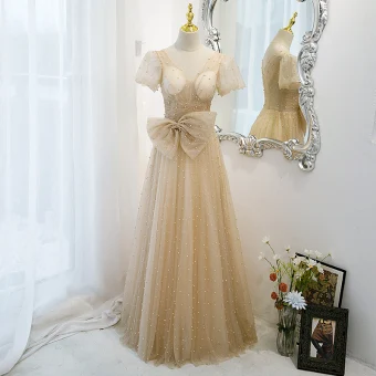 Élégant Champagne Robe De Bal Princesse 2021 V Cou Noeud Paillettes Perle Manches Courtes Dos Nu Longue Robe De Ceremonie