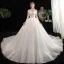 Charmant Ivoire Robe De Mariée 2020 Princesse V-Cou Perlage En Dentelle Fleur 3/4 Manches Dos Nu Cathedral Train