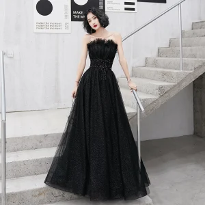Charmant Noire Robe De Soirée 2020 Princesse Volants Bustier Paillettes Dos Nu Sans Manches Train De Balayage Robe De Ceremonie