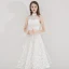 Abordable Ivoire de retour Robe De Graduation 2020 Princesse Col Haut Étoile En Dentelle Sans Manches Thé Longueur Robe De Ceremonie