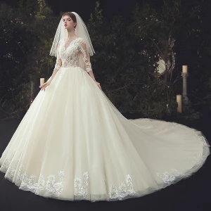 Luxury Gorgeous Illusion Ivory Wedding Dresses 2020 Ball Gown V Neck Beading Lace Flower 3 4 Sleeve Cathedral Train
