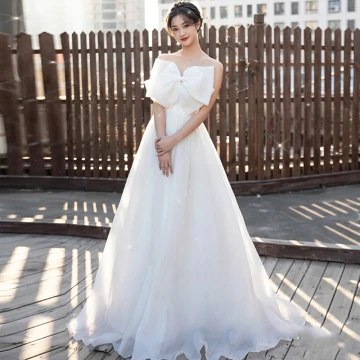 Chic Beautiful White Prom Dresses 2022 A Line Princess Strapless Bow Sleeveless Backless Floor Length Long Formal Dresses
