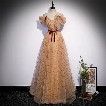 Chic Beautiful Champagne Spotted Prom Dresses 2022 A Line Princess Spaghetti Straps Short Sleeve Bow Sash Backless Floor Length Long Formal Dresses