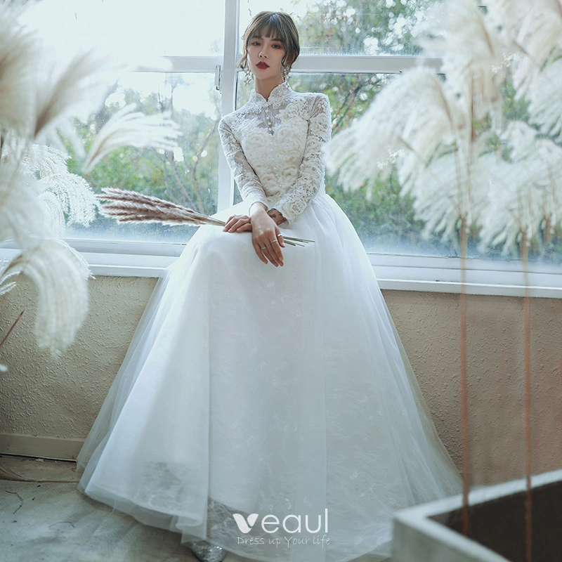 Robe de mariée col haut 2025