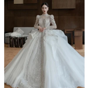 High End Hvit Gripende Ruffles Beading Perle Rhinestone Paljetter Brudekjoler 2022 Ballkjole Scoop Halsen Langermede Ryggløse Royal Train Bryllup