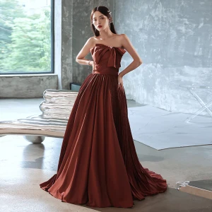 Charming Coffee Satin Prom Dresses 2022 A Line Princess Strapless Bow Sleeveless Backless Sweep Train Formal Dresses