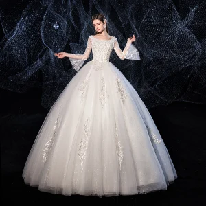 Affordable Ivory Wedding Dresses 2020 Ball Gown Glitter Tulle Scoop Neck Beading Lace Flower Bell Sleeves Backless Floor Length Long