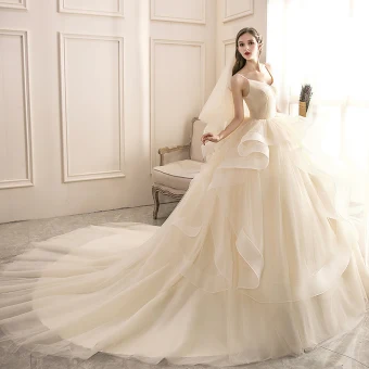Fashion Champagne Cascading Ruffles Wedding Dresses 2020 Ball Gown V Neck Sleeveless Backless Royal Train