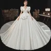 Vintage / Retro Audrey Hepburn Style Medieval Ivory Satin Wedding Dresses 2021 Ball Gown Deep V-Neck Puffy Short Sleeve Backless Royal Train Wedding